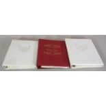 Three folders containing commemorative stamps of the wedding of HRH Prince of Wales and Lady Diana