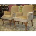 Pair of upholstered armchairs on cabriole legs