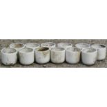 Twelve cream glazed squat cylindrical plant pots 22 cm diameter x 20 cm high, together with two