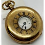 A 9ct gold cased (including dust plate) half hunter pocket watch with white enamel dial and