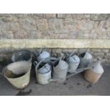 Five vintage galvanised watering cans, two galvanised buckets and an Eltex chicken feeder cover (8)