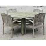A Cannock Gardens weathered teak circular garden table with slatted panelled top raised on square