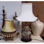 Five various table lamps in an oriental and other styles