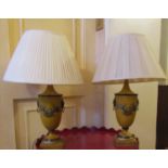 A pair of Georgian style vase shaped lamps in mustard and cream colourway