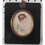 Primitive miniature portrait of a young girl in profile, watercolour and pencil on card, approx. 6 x