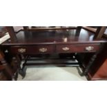 Late 19th century mahogany side table with two frieze drawers on turned supports, 120cm long