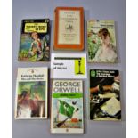 A collection of vintage Penguin paperbacks, together with some Pelican and other publications