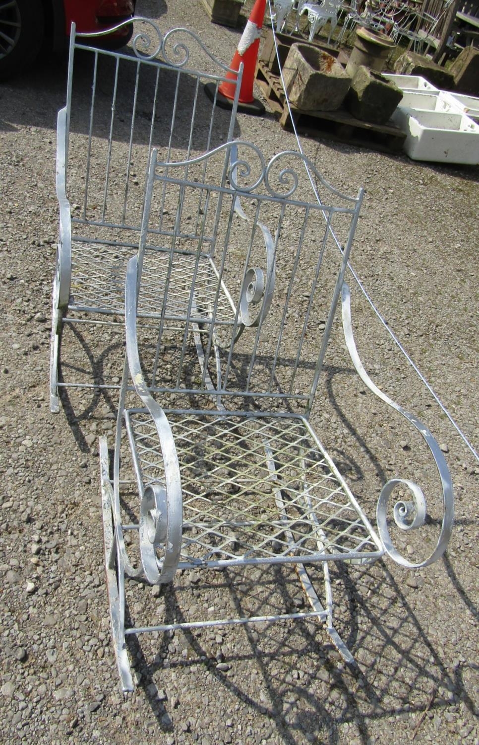 A pair of decorative painted ironwork garden rocking chairs with open scrolled arms and lattice - Image 3 of 3