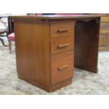 A single pedestal teak writing desk fitted with three drawers and inset leather top, 91cm wide