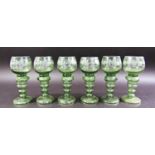 Six green hock wine glasses, seven green wine glasses on coiled base, seven cut glass wine glasses