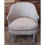 A small French tub chair with upholstered finish and painted framework