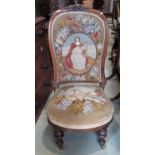 A Victorian drawing room chair with carved show wood frame, with original hand worked tapestry