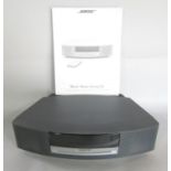 A Bosé Wave Music System III, AM, FM, DAB, CD player, together with remote control and operating