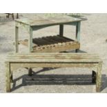 A rustic painted and weathered potting table of rectangular form with open slatted under tier, 91 cm