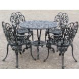 A good quality heavy gauge cast alloy garden terrace suite comprising circular top table, 89 cm in