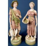 A pair of Royal Dux figures of an archer with game and a fish seller