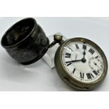 A silver plated pocket watch with enamel dial and an engraved silver napkin ring, together with a