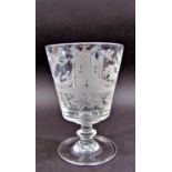 An early 19th century glass rummer, circa 1820, the bucket bowl engraved with a rural scene of a