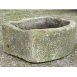 A weathered bowfronted rectangular natural stone trough, 73cm wide x 57cm deep x 32cm high
