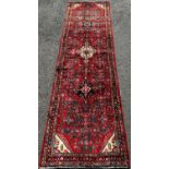 North West Persian Saveh Runner, with stylised floral medallion to the middle and repeating floral