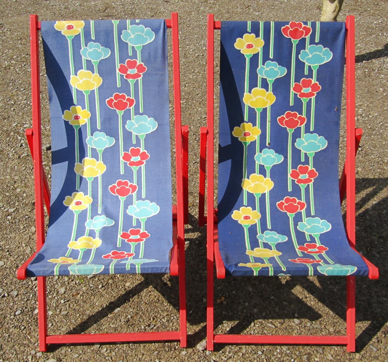 A pair of traditional folding deck chairs with painted frames, floral patterned seats, together with - Image 2 of 2