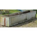 A galvanised steel rectangular field water trough with simple central strap division, 247cm long x