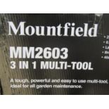A Mountfield petrol driven three in one garden multi-tool MM2603 in original cardboard packaging (