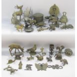 A collection of brass animals of various shapes and sizes, deer, birds, bulldog, lizards etc.