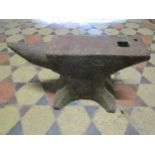An old cast iron anvil, 56 cm long x 30 cm high