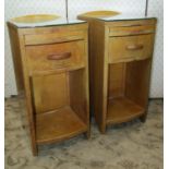 A pair of art deco pale oak bedside or lamp tables with slides and drawers