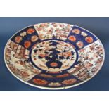 Large 19th Century Oriental Imari Charger, on a stand with turned cross-stretcher base, dish 60