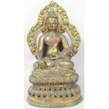 A Sino-Tibetan bronze figure of buddha depicted seated in the dhyanasana position on a lotus base of