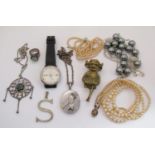 Mixed lot of jewellery to include an Aesthetic Movement silver locket with buckle decoration, a