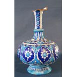 A North African vase with long drawn neck (af broken top) with all over turquoise and deep blue