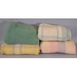 4 vintage woollen waffle blankets comprising a green/yellow blanket 1.6x1.8m, a yellow/ white/ mauve
