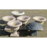A set of four moulded plastic to simulate marble garden urns of classical circular lobed form 40