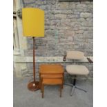 A retro mid century standard lamp complete with textured cylindrical shade together with an Omal