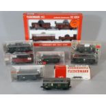 Boxed HO gauge German railway models by Fleishmann comprising 5 passenger cars in DGR green, a