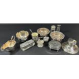 An assortment of silver hallmarked and sterling silver items including trinket boxes, a scallop salt