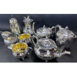 A five piece silver plated tea and coffee service with engraved floral decoration, together with a