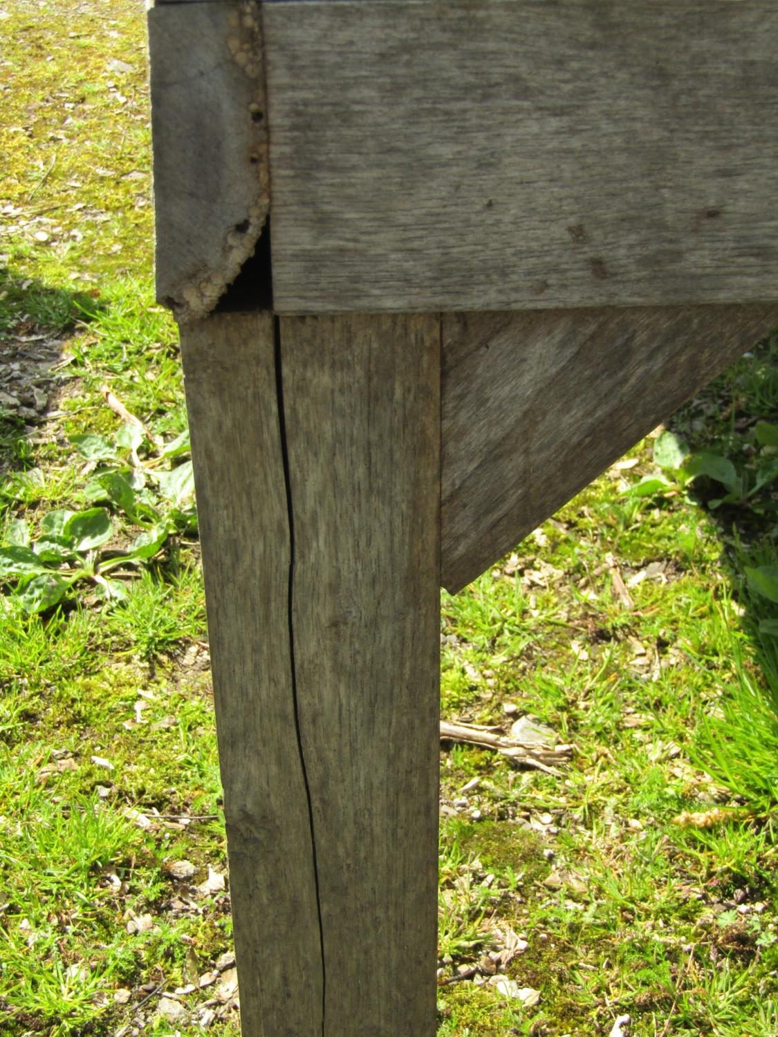 A weathered hardwood two seat garden bench with slatted seat, back and curved arms (stamped to - Image 4 of 5