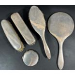 Eight pieces of assorted silver flatware, two silver backed clothes brushes, silver backed hand
