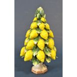 Ceramic Italian Capodimonte table centre - a bowl supporting a tower of lemons, 28cm tall