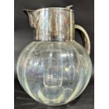 A faintly gourd shaped silver plated mounted glass water jug with an inner, removable, ice cooler