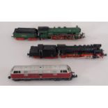 3 unboxed N gauge locomotives including Pacific Class 4-6-2 locomotive and tender in green by Arnold