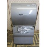 A Dyson Air Blade wall mounted hand dryer