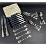 A quantity of loose shell pattern silver plated cutlery, made by Ricci Argentieri, and a case of six