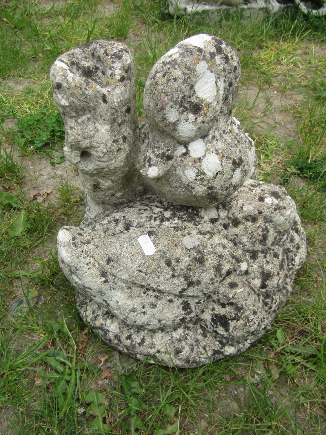 A well weathered cast composition stone garden ornament in the form of a family of ducks beside a - Image 2 of 3