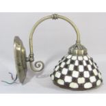 A pair of Art Nouveau style beaded mosaic wall lamps with brass effect mounts