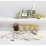 A selection of loose silver plated flatware, ivorine brushes and mirror, a set of four bakelite